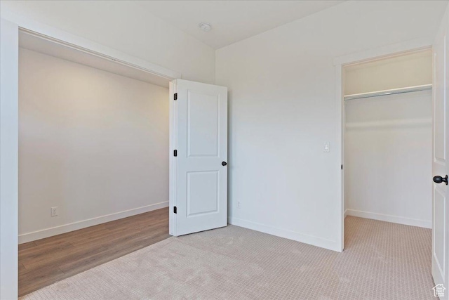 1414 N 1875 W # 131, Layton, UT 84041 - unfurnished bedroom with light carpet, baseboards, a closet, and a spacious closet