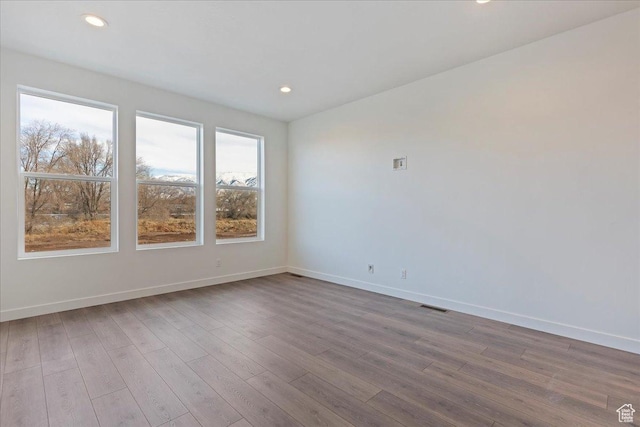 1414 N 1875 W # 131, Layton, UT 84041 - unfurnished room with baseboards, wood finished floors, and recessed lighting