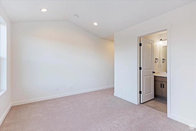 1414 N 1875 W # 131, Layton, UT 84041 - empty room featuring light carpet, baseboards, recessed lighting, and vaulted ceiling