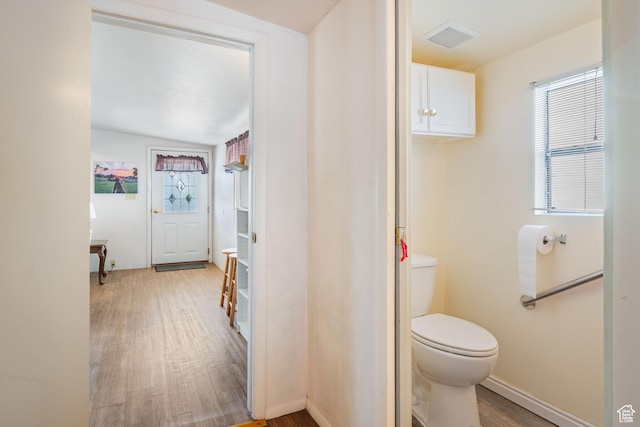 1150 W Red Hills Pkwy, Washington, UT 84780 - bathroom featuring toilet, wood-type flooring, and vaulted ceiling