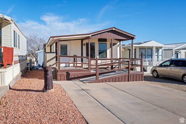 1150 W Red Hills Pkwy, Washington, UT 84780 - manufactured / mobile home featuring covered porch