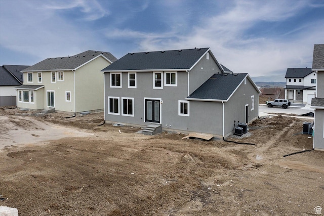 562 S 1140 E Unit 1206, Smithfield, UT 84335 - rear view of house featuring entry steps, central AC, and stucco siding