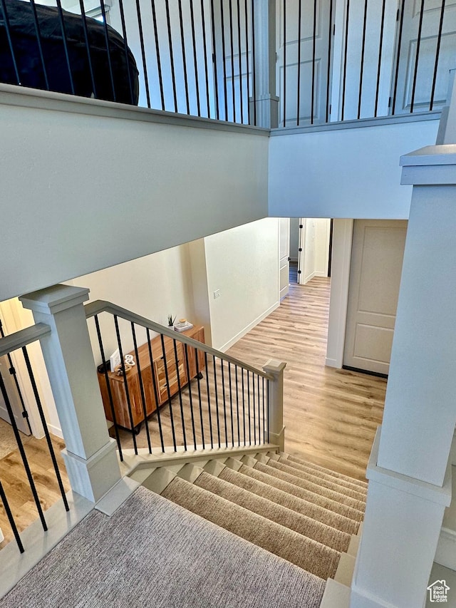 3235 S Retreat Dr, Hurricane, UT 84737 - stairway with wood-type flooring and a high ceiling