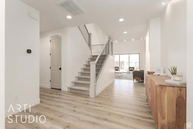 3235 S Retreat Dr, Hurricane, UT 84737 - stairway featuring wood-type flooring