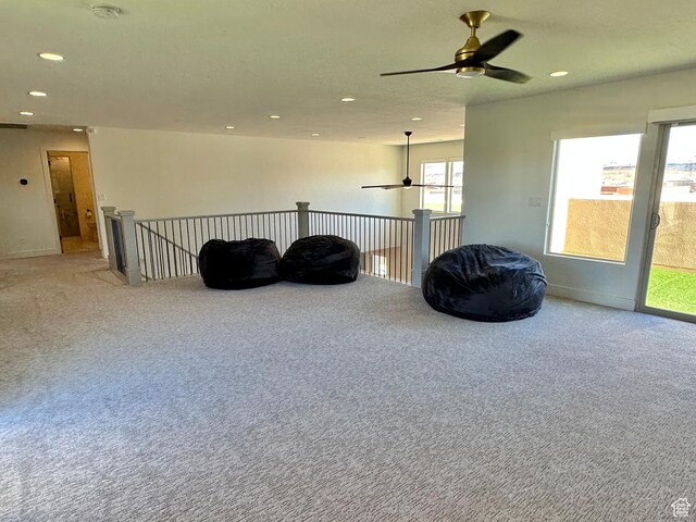 3235 S Retreat Dr, Hurricane, UT 84737 - living area with carpet and ceiling fan