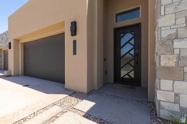 3235 S Retreat Dr, Hurricane, UT 84737 - view of exterior entry with a garage