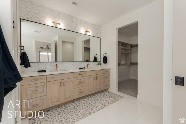3235 S Retreat Dr, Hurricane, UT 84737 - bathroom featuring backsplash, ceiling fan, tile patterned floors, and vanity