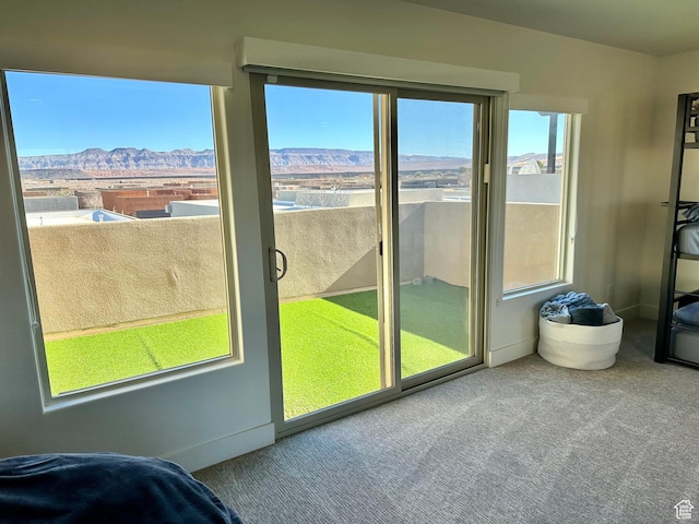 3235 S Retreat Dr, Hurricane, UT 84737 - doorway with a mountain view and carpet flooring