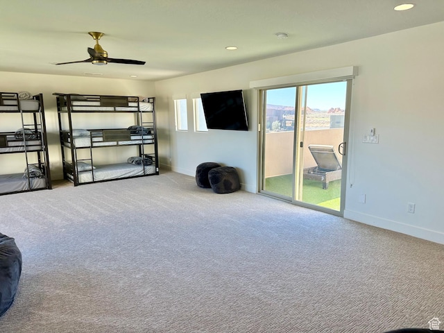 3235 S Retreat Dr, Hurricane, UT 84737 - living room with carpet flooring and ceiling fan