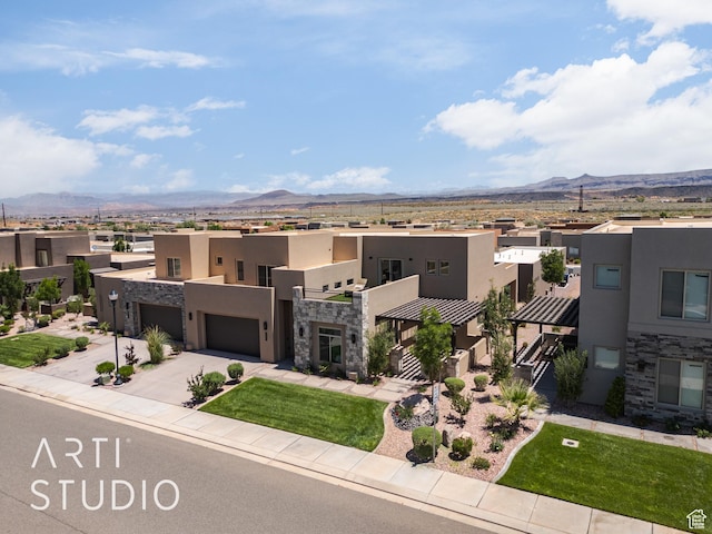 3235 S Retreat Dr, Hurricane, UT 84737 - view of front of home with a mountain view and a garage