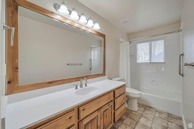 893 N 400 E, Springville, UT 84663 - bathroom with vanity, shower / bathtub combination with curtain, and stone finish floors