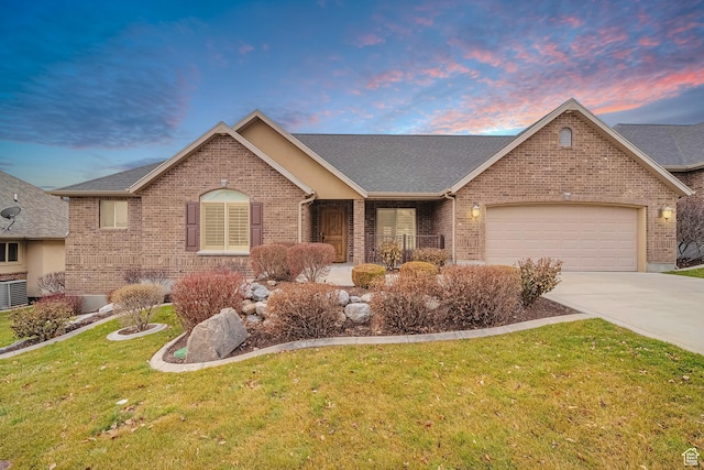 893 N 400 E, Springville, UT 84663 - ranch-style home featuring brick siding, a lawn, driveway, and a garage