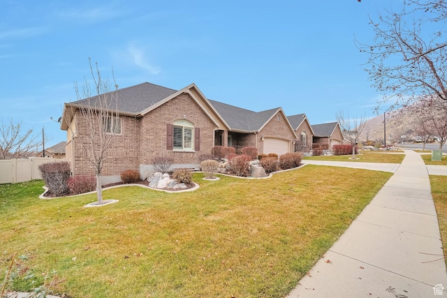 893 N 400 E, Springville, UT 84663 - view of front facade featuring brick siding, roof with shingles, a garage, and concrete driveway