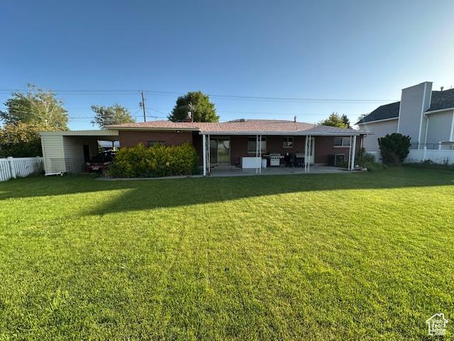 2429 W 300 N, West Point, UT 84015 - rear view of property with a patio