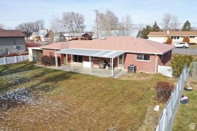 2429 W 300 N, West Point, UT 84015 - rear view of property featuring a lawn, central AC unit, and a patio