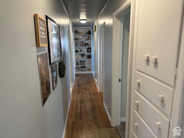 2429 W 300 N, West Point, UT 84015 - hallway featuring dark hardwood / wood-style flooring and built in features