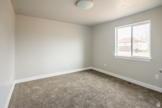view of carpeted spare room