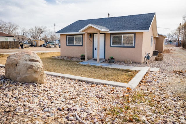 bungalow with central air condition unit