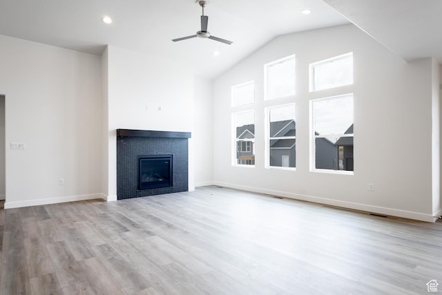 695 S 3550 W Unit 137, West Weber, UT 84401 - unfurnished living room with light wood-type flooring, vaulted ceiling, and ceiling fan