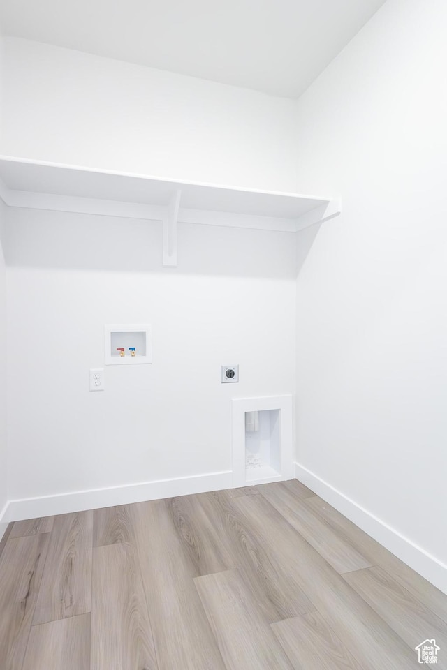 695 S 3550 W Unit 137, West Weber, UT 84401 - laundry area with hookup for an electric dryer, hookup for a washing machine, and light hardwood / wood-style floors
