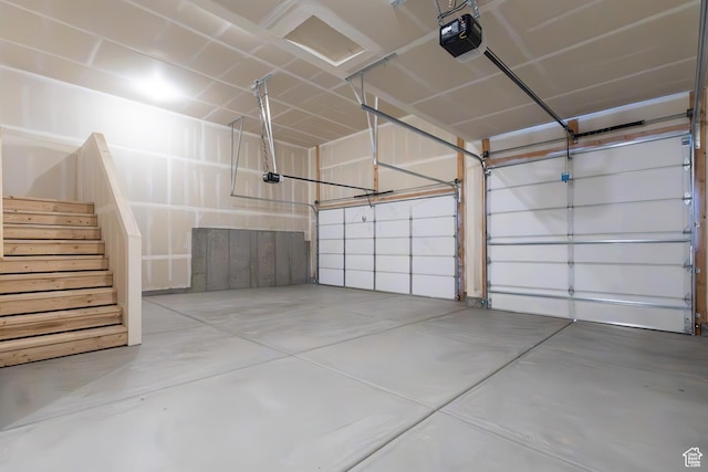 695 S 3550 W Unit 137, West Weber, UT 84401 - garage featuring a garage door opener