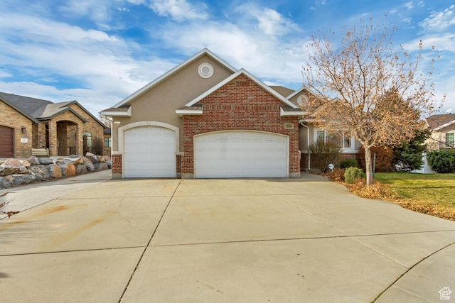 563 W Kalia Cv, Murray, UT 84123 - view of front of house with a garage