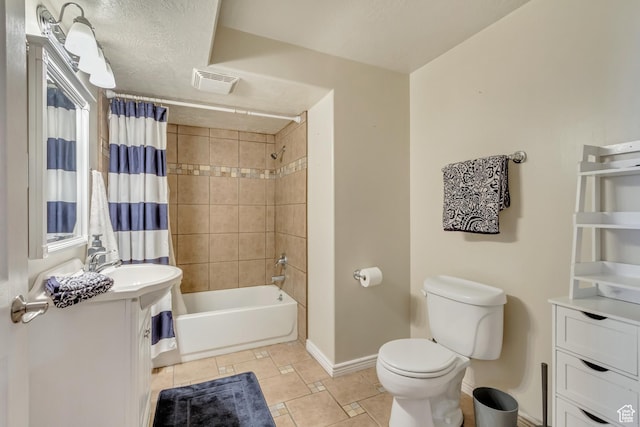 563 W Kalia Cv, Murray, UT 84123 - full bathroom featuring shower / bath combo, vanity, tile patterned flooring, toilet, and a textured ceiling
