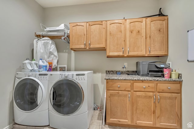 563 W Kalia Cv, Murray, UT 84123 - laundry room featuring cabinets, light tile patterned floors, and washing machine and clothes dryer