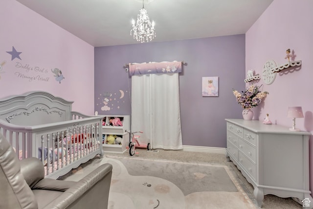 563 W Kalia Cv, Murray, UT 84123 - carpeted bedroom with a notable chandelier and a crib