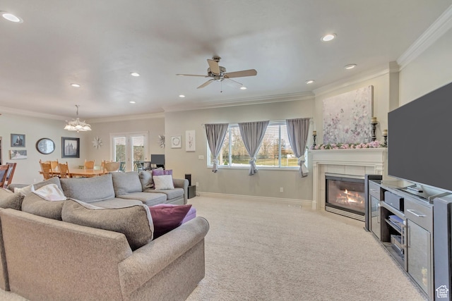 563 W Kalia Cv, Murray, UT 84123 - living room with a tile fireplace, ceiling fan with notable chandelier, a wealth of natural light, and crown molding