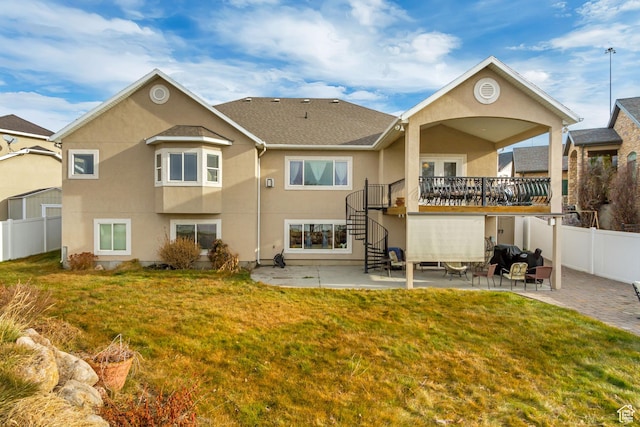 563 W Kalia Cv, Murray, UT 84123 - rear view of property featuring a patio and a lawn