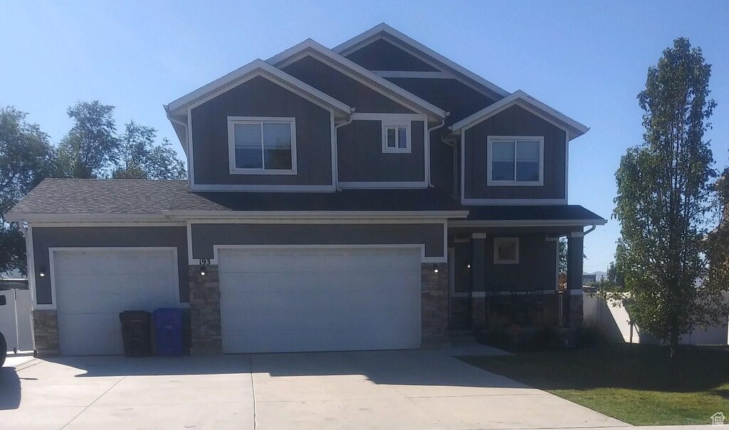 14617 S King Quail Way Unit 5, Bluffdale, UT 84065 - view of front facade with a garage