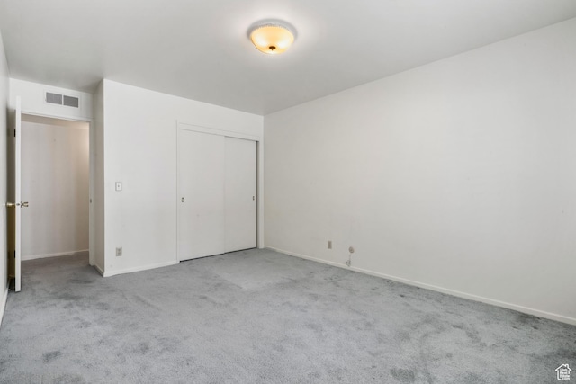 1194 E 2700 S Unit C18, Salt Lake City, UT 84106 - unfurnished bedroom with light carpet and a closet