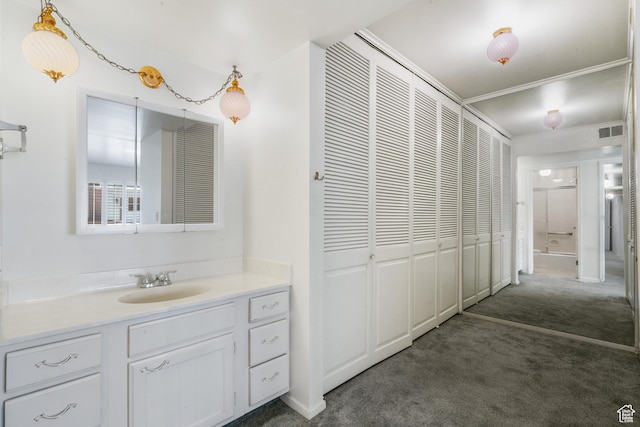 1194 E 2700 S Unit C18, Salt Lake City, UT 84106 - bathroom with vanity and crown molding