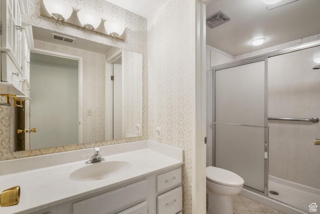 1194 E 2700 S Unit C18, Salt Lake City, UT 84106 - bathroom featuring vanity, toilet, and a shower with shower door