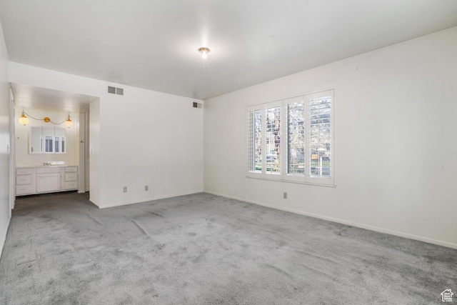 1194 E 2700 S Unit C18, Salt Lake City, UT 84106 - unfurnished bedroom with carpet floors and ensuite bath