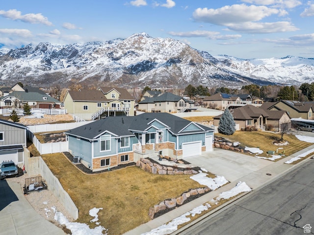 bird's eye view with a residential view and a mountain view