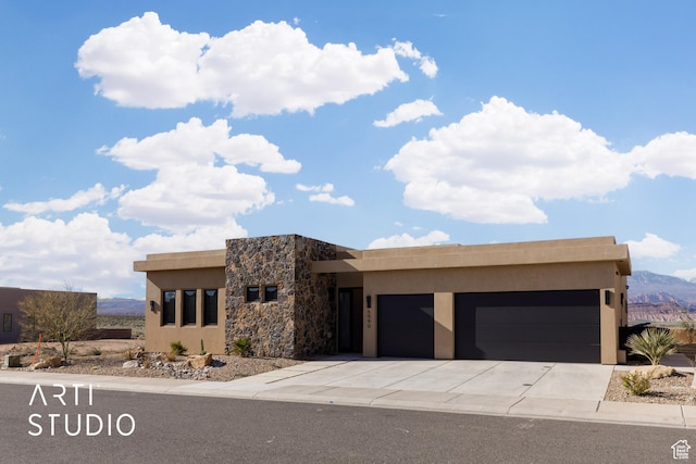 5090 W 3175 S, Hurricane, UT 84737 - southwest-style home with a mountain view and a garage
