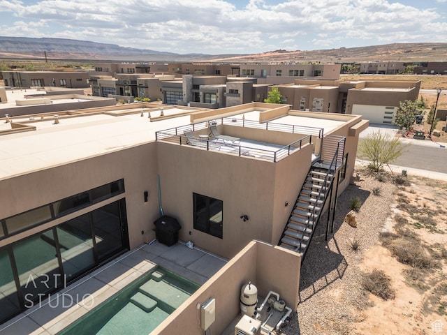 5090 W 3175 S, Hurricane, UT 84737 - exterior space with a mountain view and a patio area