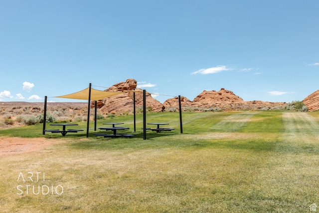 5090 W 3175 S, Hurricane, UT 84737 - view of community with a mountain view and a yard