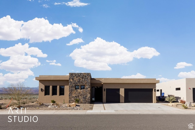 5090 W 3175 S, Hurricane, UT 84737 - pueblo revival-style home featuring a garage