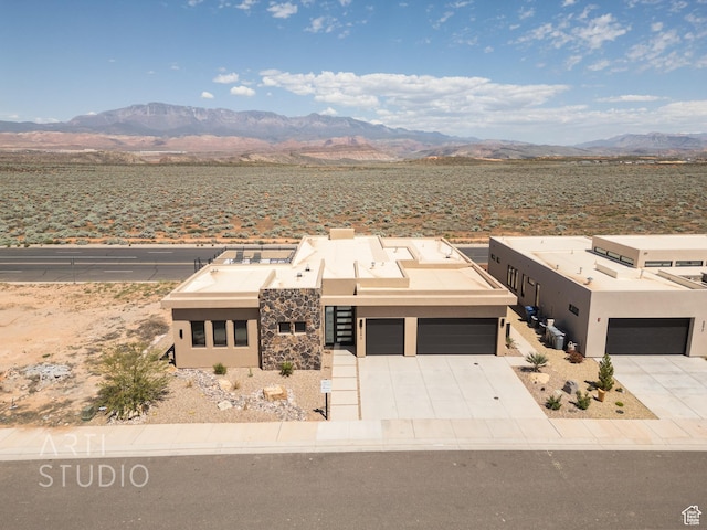 5090 W 3175 S, Hurricane, UT 84737 - view of front of house featuring a mountain view and a garage
