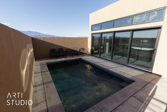 5090 W 3175 S, Hurricane, UT 84737 - view of pool with a mountain view and a patio