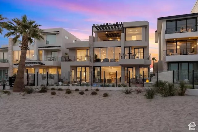 5359 S Pura Cir Unit 142, St George, UT 84790 - view of back house at dusk