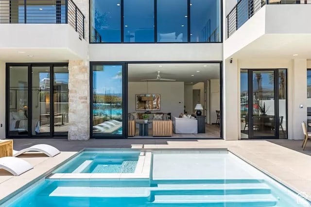 5359 S Pura Cir Unit 142, St George, UT 84790 - exterior space with ceiling fan, a patio, and a pool with hot tub