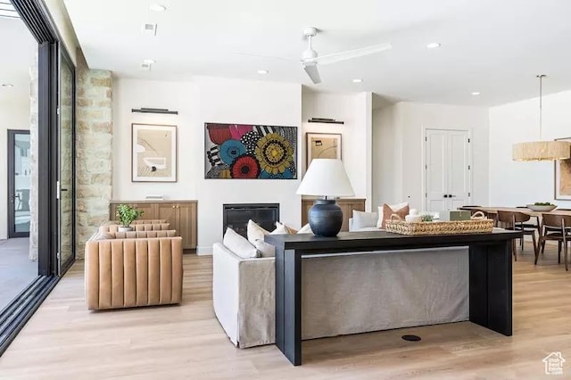 5359 S Pura Cir Unit 142, St George, UT 84790 - living room with ceiling fan and light hardwood / wood-style flooring