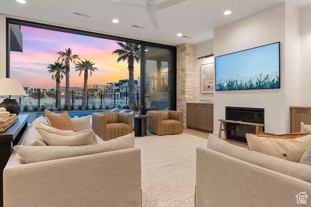 5359 S Pura Cir Unit 142, St George, UT 84790 - carpeted living room featuring expansive windows and ceiling fan