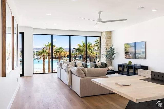 5359 S Pura Cir Unit 142, St George, UT 84790 - living room with light hardwood / wood-style flooring and ceiling fan