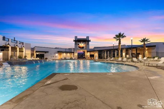 5359 S Pura Cir Unit 142, St George, UT 84790 - pool at dusk with a patio area