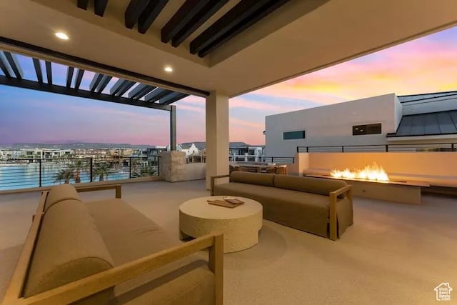 5359 S Pura Cir Unit 142, St George, UT 84790 - exterior space with a water view and an outdoor living space with a fire pit
